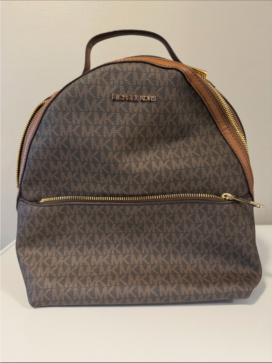 Michael Kors Handbags - Michael Kors Brown Logo Dome Small Backpack with Gold Hardware